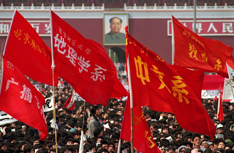 Red flags in Tiananmen Square during a huge May Day protest. © 1989 AP Photo/Mark Avery