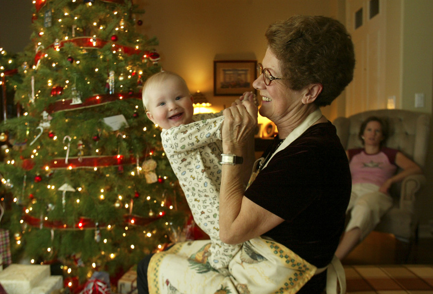 Rosza Fenyoe plays with her grandson Hayden on Christmas Day. © 2002 by Mark Avery